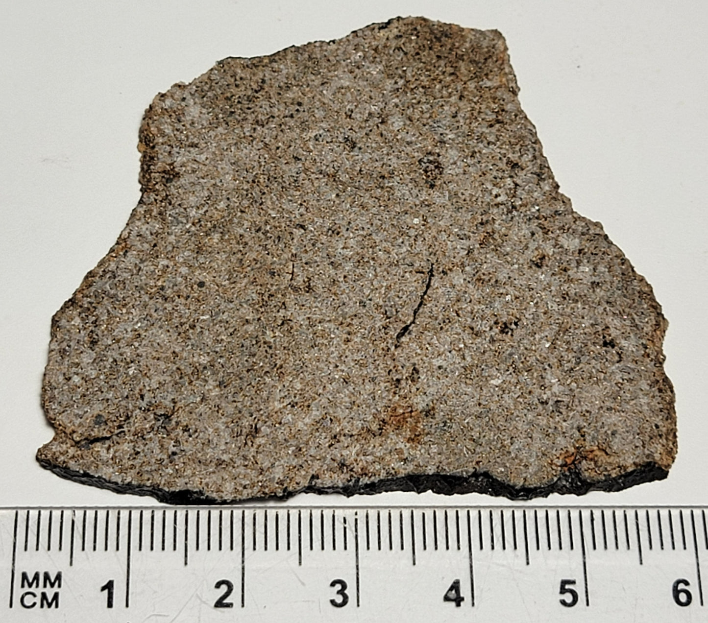 Tirhert Achondrite Unbrecciated Eucrite Crusted Slice - 13.5g